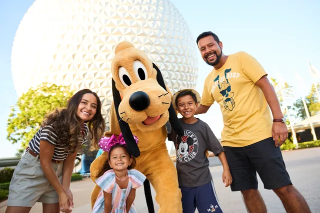 Family with Pluto at Disney's EPCOT